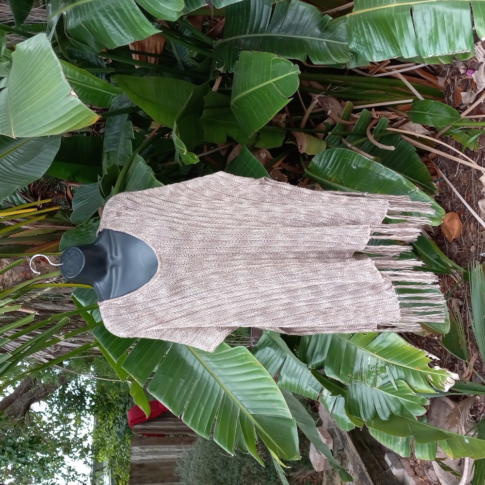 - Entro crochet Poncho with fringe